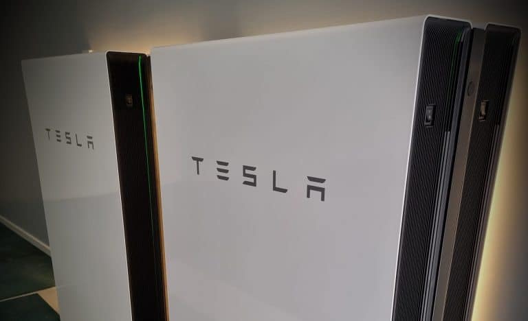 Tesla Powerwall backlit angle view scaled e1682650282176